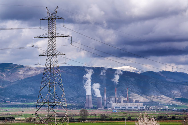 An,Electricity,Pylon,With,A,Lignite,Power,Plant,At,The – المضارب العربي